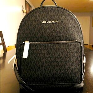 MICHAEL KORS bag pack.